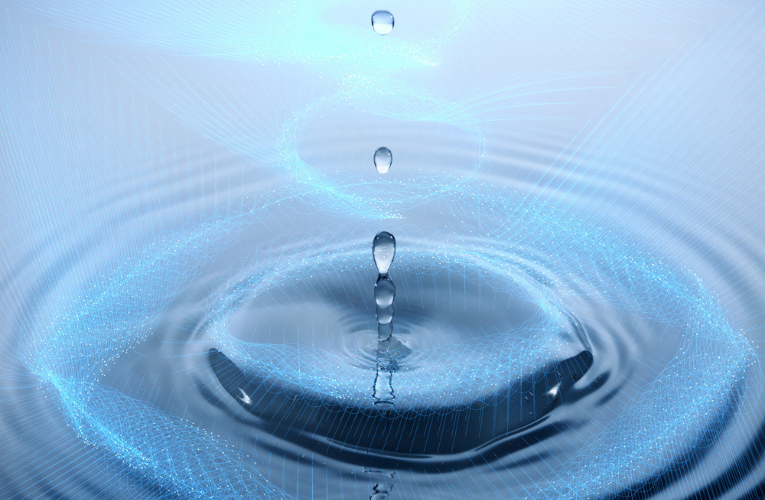 A macro photograph of a water droplet hitting a surface, integrated with blue digital light trails and geometric connections. Conceptualizes microfluidic systems in soft robotics and smart liquids. Macro photography combined with 3D rendering.